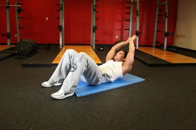 Abdominal com Braços Acima da Cabeça