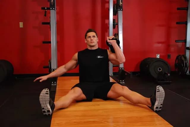 Desenvolvimento Sentado com Kettlebell