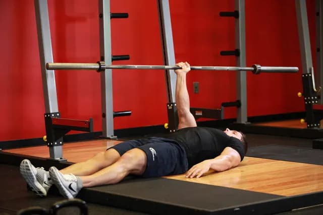 Supino no Chão Unilateral