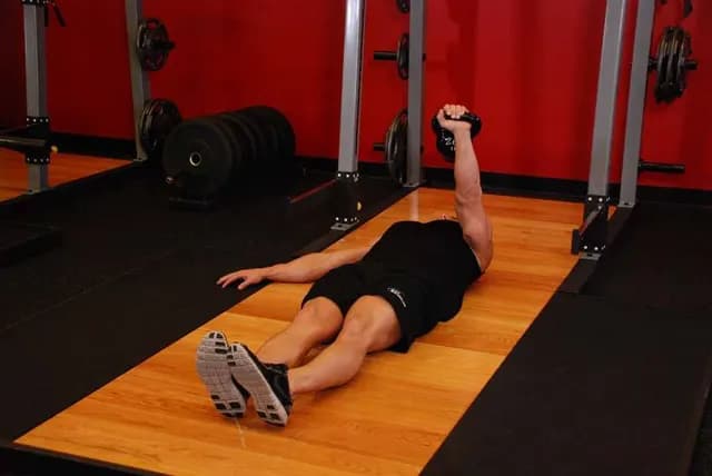 Supino Unilateral com Kettlebell no Chão