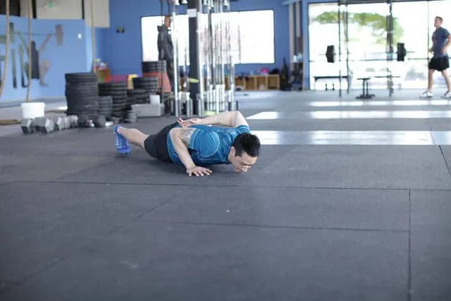 Flexão com Um Braço
