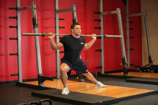 Agachamento Lateral com Barra