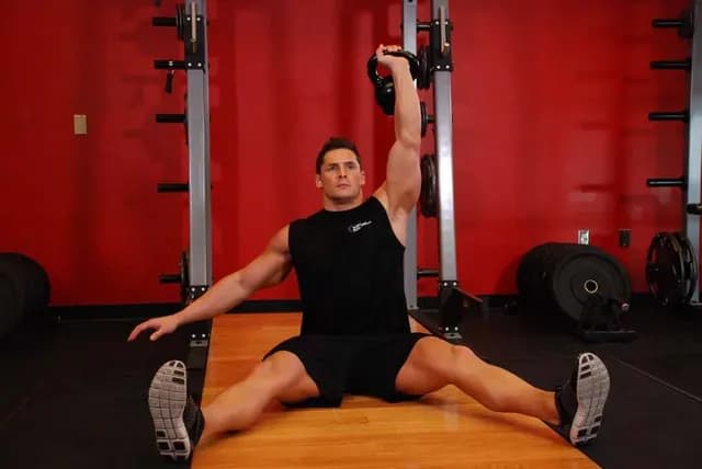 Desenvolvimento Sentado com Kettlebell
