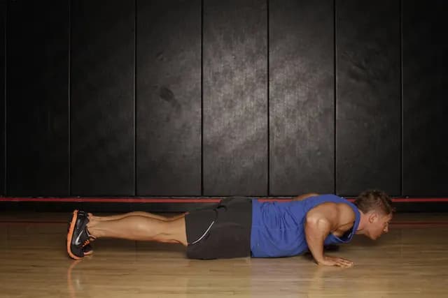 Flexão de Braço com Prancha Lateral